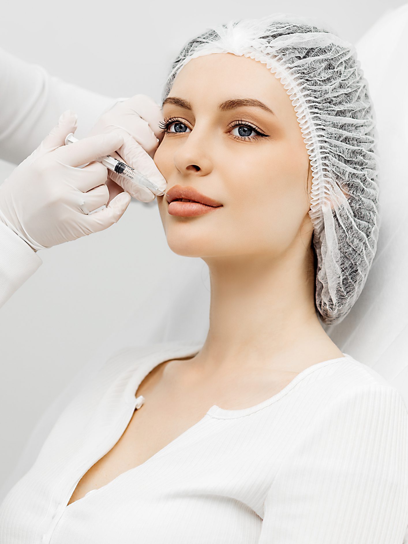 Lip Augmentation. Woman Getting Beauty Injection For Lips